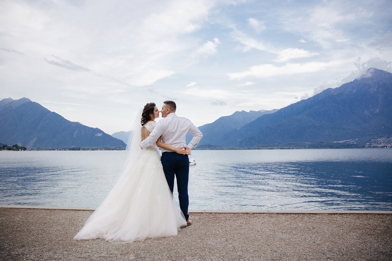 Services-03 Bride and groom share a romantic moment by Lake Como in Menaggio, Italy.
